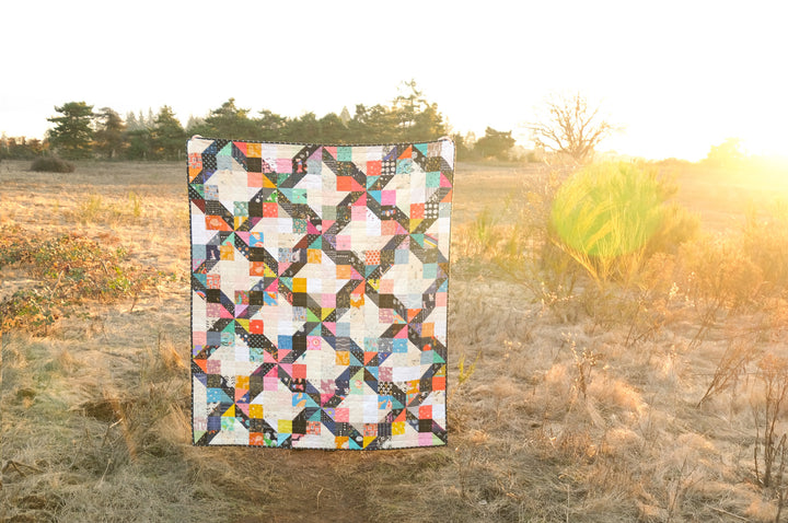 A Scrappy Melody Quilt + Some Luxe Cuddle Tips