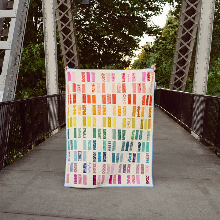 A Scrappy, Rainbow, Ruby Star Society Natalie Quilt
